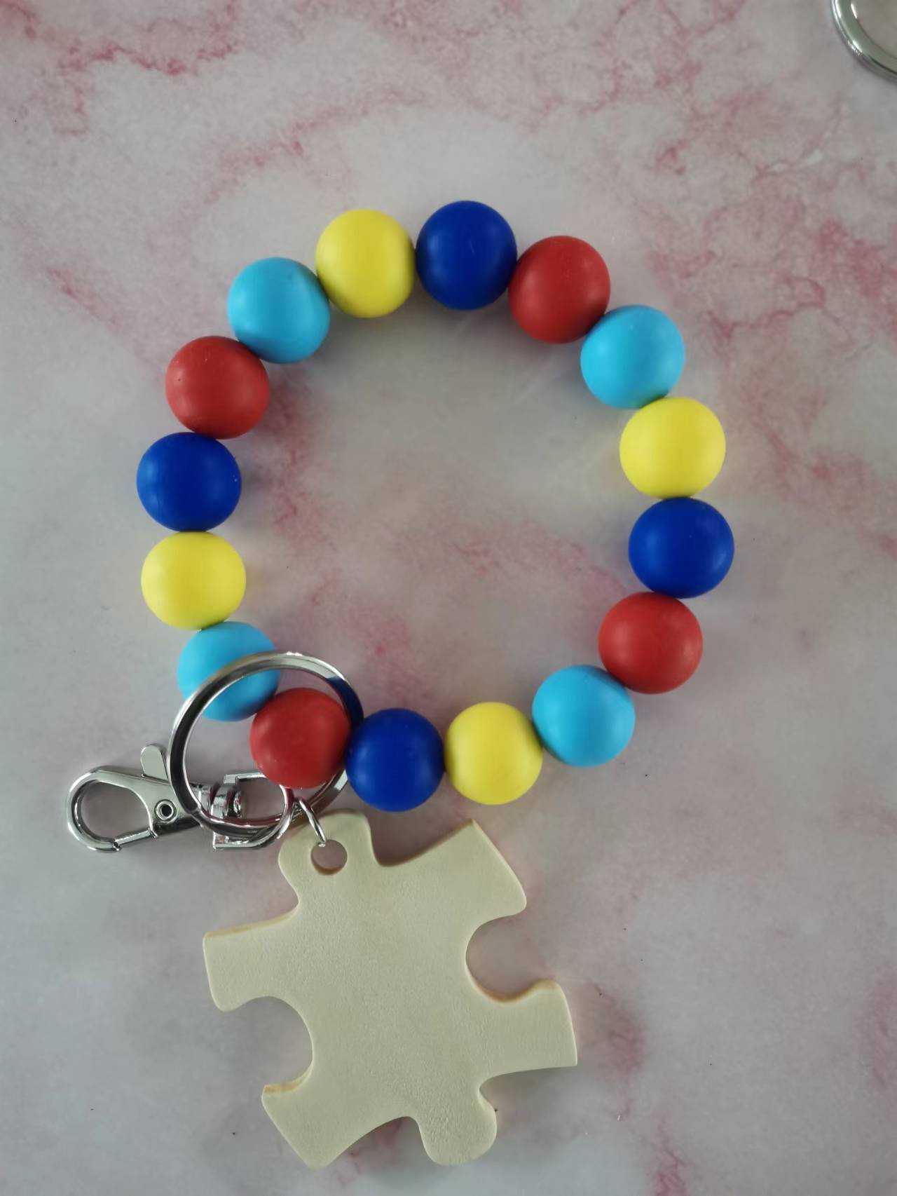 #38 Autism with Puzzle Piece Silicone Wristlet Keychain w/ Tassel